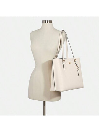 Coach حقيبة يد جلدية كبيرة للنساء ، ذات تصميم كلاسيكي رجعي، ذات شعار عربة "Mollie 34"، مناسبة للتسوق والحمل على الكتف، لون بني داكن مزين بزخرفة أزهار قديمة