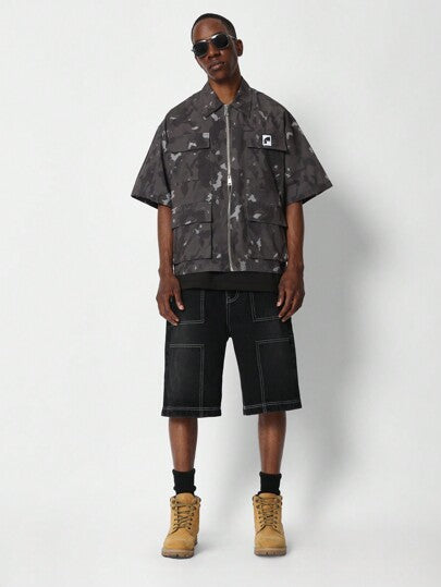 SUMWON قميص بطبعة الكامو مع سحّاب يلائم القصيرة