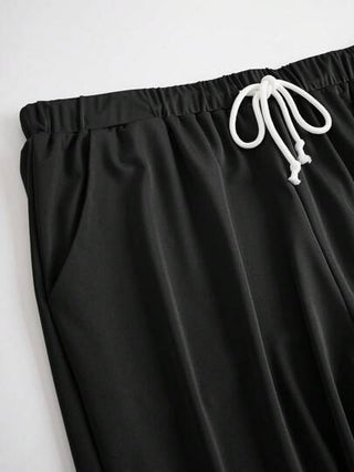 SHEIN طقم مكون من قطعتين بلون سادة وكتف مائل يومي بمقاس كبير للنساء