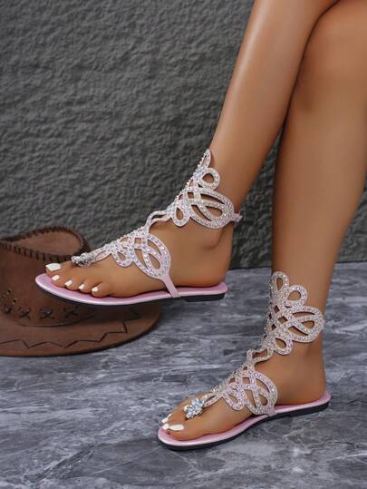 بوت نسائي موديل 2025 ذو شكل روماني عالي الطول ، صنادل شقة بلورية تنفس ، بوت جلد طويلة مفرغة ذات إبزيم حقيقي