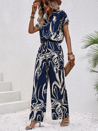 SHEIN Clasi سترة نسائية بأكمام قصيرة وبنطلون طويل بتصميم عشوائي مطبوع لفترة الاستجمام