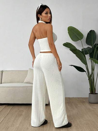 طقم حريمي قطعتين EZwear مجموعة كروب توب وسروال واسع منسوج للسيدات باللون البيج، بدون أكمام ورقبة هالتر وبدلة عصرية