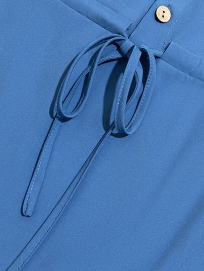 فستان قطعة واحدة بأزرار أمامية وخصر مشدود