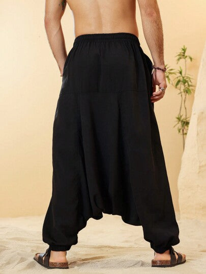 Manfinity Nomadique بناطيل رجالية بجيب أسفل وتنورة واسعة للخروج، بناطيل هاريم طويلة فضفاضة ذات لون واحد، هدايا للزوج أو الصديق