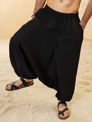 Manfinity Nomadique بناطيل رجالية بجيب أسفل وتنورة واسعة للخروج، بناطيل هاريم طويلة فضفاضة ذات لون واحد، هدايا للزوج أو الصديق