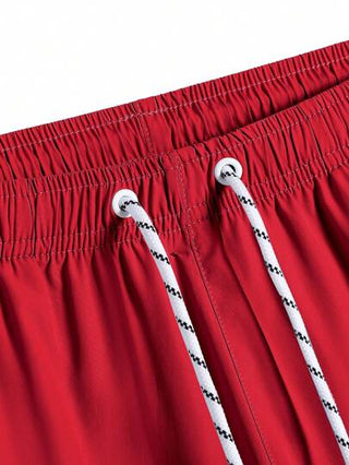 Manfinity KASUA شورتات شاطئ مع رباط خصر لون أحادي للرجال