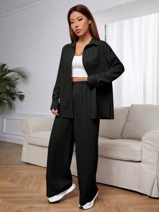 طقم حريمي قطعتين EZwear زي عارضة نسائية أسود مناسب مؤلف من بنطلون وقميص فضفاض بأكمام طويلة وكتفين منخفضة لباس عارضة عادي