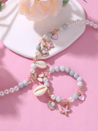 طقم قلادة وأساور ثنائي مكون من لؤلؤ واصداف الفراشة والنجمة البحرية للبنات