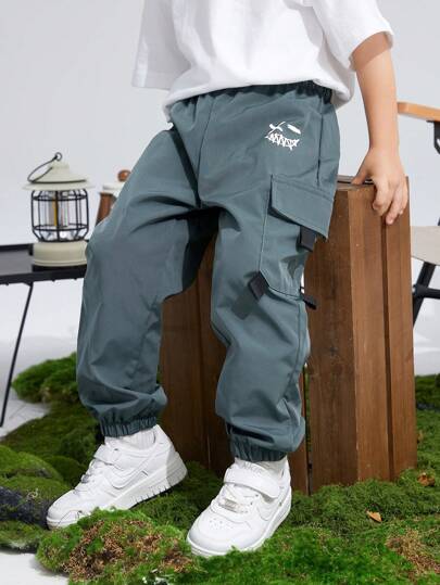 بنطال جوجر طفولي بنمط جرافيك جانبي قطع مريح بلون أحادي للأطفال الذكور