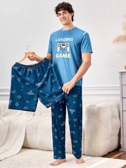 طقم بيت رجالي مكون من 3 قطع، توب بياقة دائرية وأكمام قصيرة مطبوع عليه رسومات وبنطلون مطبوع عليه بالكامل