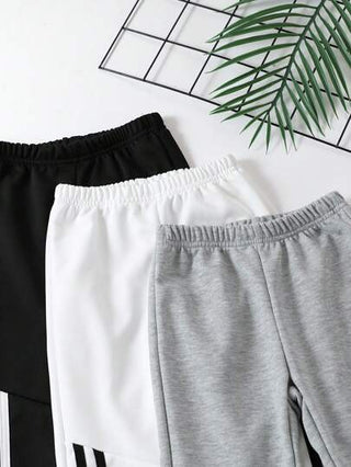 SHEIN بنطلون كاجوال مستقيم الساق ذو خصر مطاطي مخطط أزياء للفتى الصغير