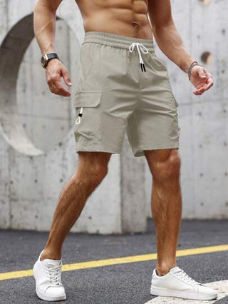 Manfinity Homme شورت للرجال بجيوب قابلة للطي وخصر مخصر بحبل من الجانب