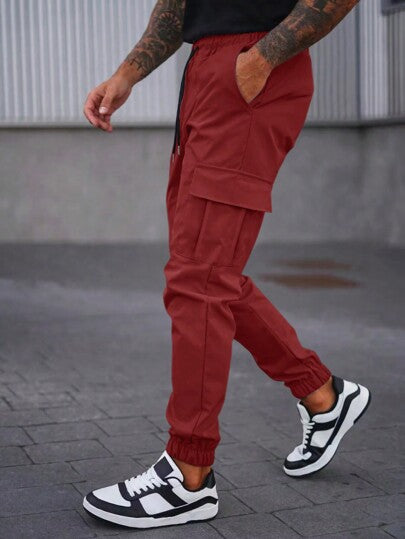 Manfinity LEGND بنطال جوغر بخصر مطاطي وجيوب بسحاب ملابس رجالية كاجوال