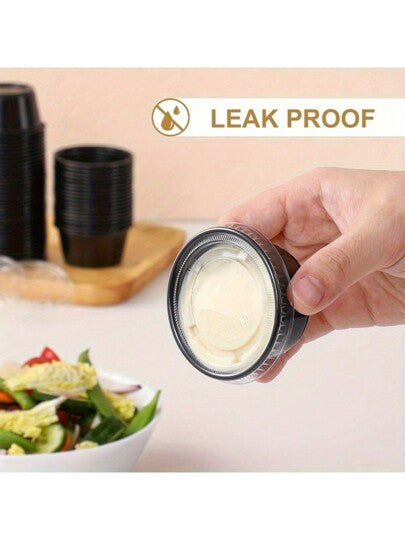 25 / 50 قطعة أكواب بلاستيكية سوداء للحصص، سعة 60 مل / 2 أوقية كوب بلاستيك مع أغطية محكمة لهلام السلطة، مناسبة للحفلات والسفر والاستخدام المنزلي، ديكور وهدايا وزينة