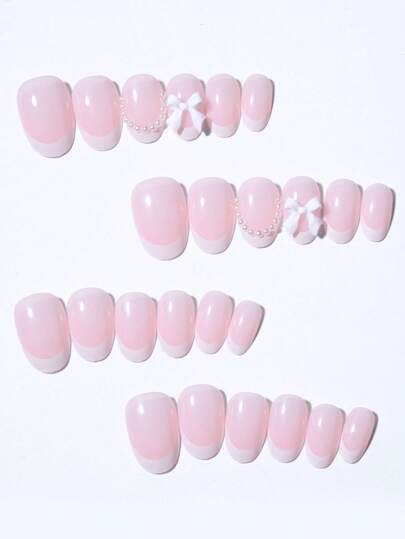 طقم أظافر صناعية قصيرة بطراز فرنسي أبيض بيضاوي 24 قطعة تصميم وردة قصيرة مزينة باللؤلؤ يناسب بشكل مثالي، يحتوي على جل لاصق 1 قطعة وملف أظافر 1 قطعة، أظافر طراز فرنسي للنساء والبنات لاستخدامها في العمل والدراسة والمناسبات اليومية اضافر صناعيه اظافر اصطناع