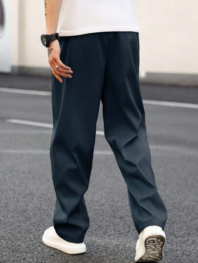 Manfinity Homme بنطلون رجالي أساسي بخصر رباط مستقيم فضفاض عادي