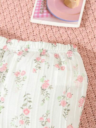 SHEIN طقم بيجامة بسيطة للفتيات مكون من شورت بطباعة زهور والبلوزة قصيرة الأكمام 2 قطعة