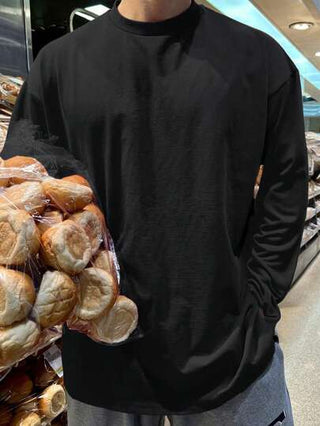 DAZY تي شيرت كاجوال بأكمام طويلة وياقة دائرية قصة فضفاضة للرجال باللون الأسود سادة