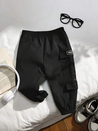 SHEIN بناطيل أطفال بنين/بنات كاجوال متعددة الجيوب بسحاب وزخارف حرف ملائمة للارتداء اليومي والرياضة والأنشطة الخارجية