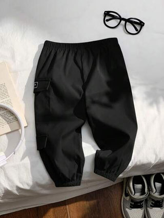 SHEIN بناطيل أطفال بنين/بنات كاجوال متعددة الجيوب بسحاب وزخارف حرف ملائمة للارتداء اليومي والرياضة والأنشطة الخارجية