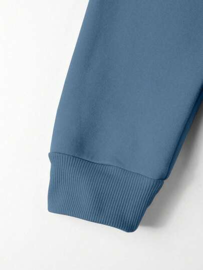 Manfinity Homme قميص ثقيل رياضي بغطاء رأس ذو سحاب وكتابات عادية للرجال، خريف/شتاء