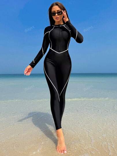 مايوه حريمي قطعة واحدة Bikinx بذلة سباحة يونيسكس مع سحاب ذات أكمام طويلة، لون قاعدة صلب مع حواف نحيفة متباينة، بطراز رياضي مناسب للصيف