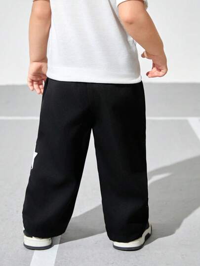 SHEIN بنطلون أطفال ذكور كاجوال ذو وضع عادي وفضفاض وخصر ركوب