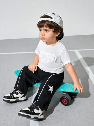 SHEIN بنطلون أطفال ذكور كاجوال ذو وضع عادي وفضفاض وخصر ركوب