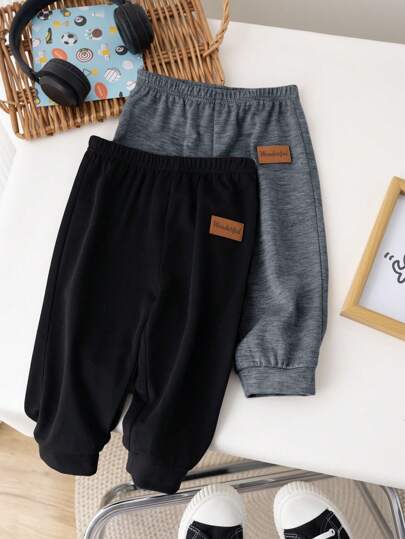 SHEIN مجموعة بنطلونات صبي/فتاة رضيع 2 قطعة لون سادة مطاطي الخصر مناسبة للاستخدام اليومي