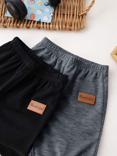 SHEIN مجموعة بنطلونات صبي/فتاة رضيع 2 قطعة لون سادة مطاطي الخصر مناسبة للاستخدام اليومي