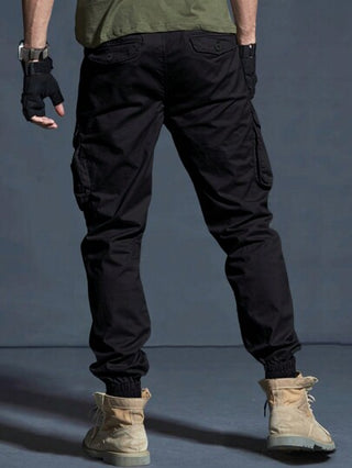 Manfinity Homme بنطال كاجوال سادة أمامي بجيب بسيط التصميم، ملابس يومية للرجال