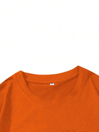 Manfinity Homme تي شيرت كاجوال شارع رجالي فضفاض أكمام قصيرة، أكتاف منسدلة، طباعة نقوش حرفية، لون أحادي، مناسب للصيف