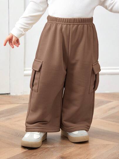 SHEIN بنطلون مريح مستقيم من البرمة، بجيوب قصاصات للأطفال الصغار، بنمط كوري عادي، ملائم للأطفال الصغار