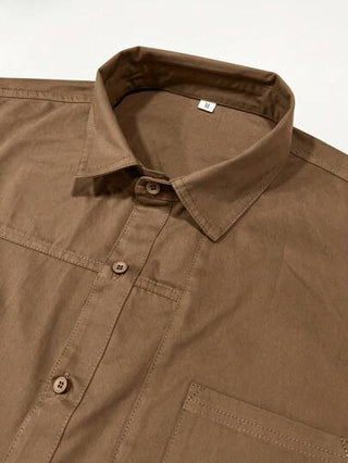 قميص قطن كاجوال للرجال ذو لون أحادي بجيوب متعددة وتصميم عتيق، مريح للارتداء اليومي في الربيع والصيف