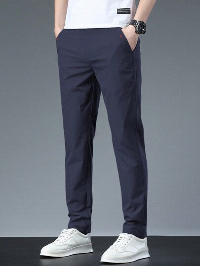 بنطلون رجالي أنيق بتصميم ضيق مع جيوب، لون أحادي