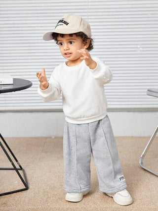 SHEIN بناطيل تدفئة مطبوع عليها حرف للأولاد الرضع، قطعة راحة كاجوال، مناسبة للخروجات والمدرسة والسفر والارتداء اليومي والرياضة، مناسب للخريف والشتاء