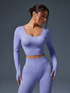 SHEIN Sport Studio طقم ملابس رياضية نسائية ذو لون أحادي مكون من بلوزة بأكمام طويلة وبنطلون، متناسق الخياطة