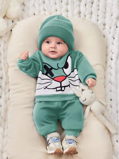 مجموعة قطعتين للبيبي ولد، بتصميم فضفاض مريح من بنطلون محبك ذو لون واحد وكنزة هوديي، مناسب للسفر في فصل الخريف/الشتاء