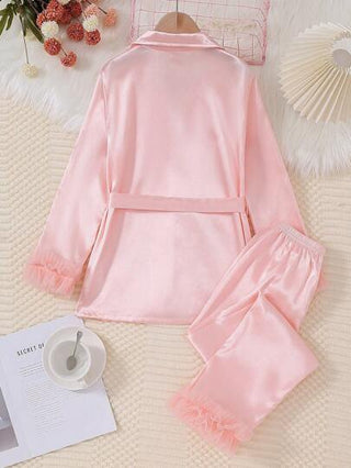 بيجاما بنطلون ولباس علوي شابة وردية موحد اللون مجموعة ملابس نوم أنيقة مزودة بأكمام طويلة وأطراف من الحرير