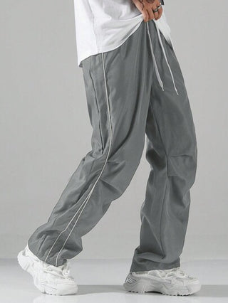 Manfinity Hypemode بنطلون رجالي كاجوال ذو نمط حرفي بأنابيب تباين خصر بسحاب