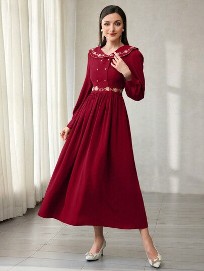 Modelyn فستان أمسيات طويل ذو أكمام طويلة من لون واحد أنيق مزين بالخرز المطرز