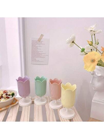 حامل أقلام بشكل زهرة الزنبق من البلاستيك - منظم مكتبي على المكتب لحفظ الأقلام والمستحضرات التجميلية والقرطاسية