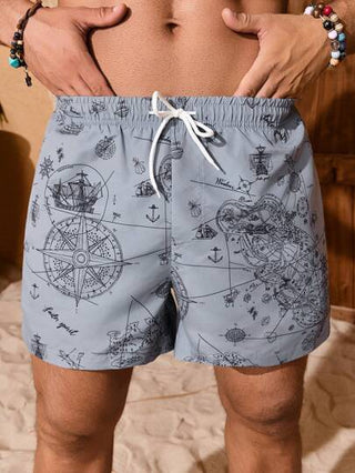 Manfinity Swimmode شورت شاطئ مطبوع بنمط ألوان مختلطة مع جيوب وربطة أمامية، كاجوال للعطلات الاسترخاء والأجواء الهاواي