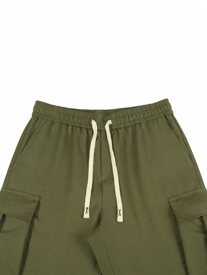 Manfinity EMRG سراويل كاجوال للرجال ذات خصر بحبل رباط وجيوب جانبية