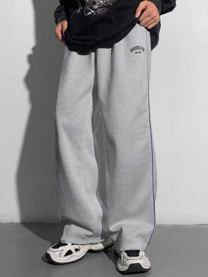 ملابس رياضية أطفال بنطلون للمراهقين ذو ساق مستقيمة فضفاضة، مع تفاصيل سوداء متباينة، بنطلون كاجوال قابل للتنسيق لجميع المناسبات ملائم للخريف والشتاء، للمدرسة والمنزل والاستخدام اليومي والرياضة وحفلات عيد الميلاد والخروجات، بتصميم رجعي