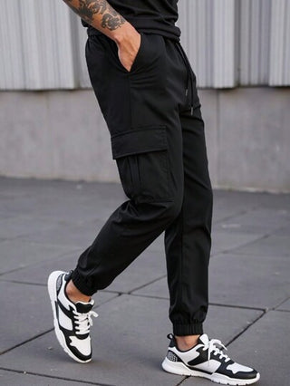 Manfinity Homme بنطال رجالي ارتيادي سائب ذو خصر مطاطي وأساور، بنطال سائب بحبل الخصر، مناسب للاستخدام اليومي والنزهات الخارجية، هدية للأصدقاء والأزواج والأحباء