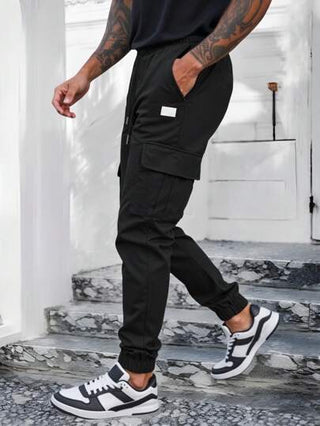 Manfinity Homme بنطال رجالي ارتيادي سائب ذو خصر مطاطي وأساور، بنطال سائب بحبل الخصر، مناسب للاستخدام اليومي والنزهات الخارجية، هدية للأصدقاء والأزواج والأحباء