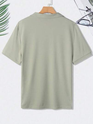 Manfinity Homme قميص بولو كاجوال أكمام قصيرة أحادي اللون للرجال