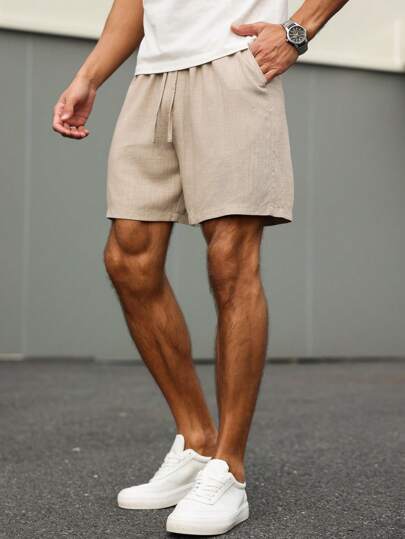 Manfinity Homme شورت كاجوال للرجال بخصر بسير وجيب ذو لون واحد