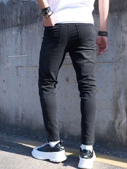 بنطال جينز أسود رفيع مطاطي برقع زخرفية ومسبوك بثقوب، بنطلون ضيق أنيق بقصة الوسط الممشوق